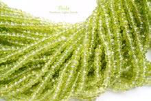 Load image into Gallery viewer, (1 row 36 cm 100 grains) High quality large peridot button cut rondel cut 4.5-5.5 x 3.5 mm