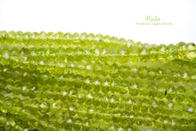 Load image into Gallery viewer, (1 row 36 cm 100 grains) High quality large peridot button cut rondel cut 4.5-5.5 x 3.5 mm