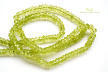 Load image into Gallery viewer, (1 row 36 cm 100 grains) High quality large peridot button cut rondel cut 4.5-5.5 x 3.5 mm