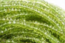 Load image into Gallery viewer, (1 row 36 cm 100 grains) High quality large peridot button cut rondel cut 4.5-5.5 x 3.5 mm