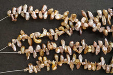 Load image into Gallery viewer, (1 row 35 cm, 25 pieces) Freshwater pearl puff coin natural color mauve pink ~ purple