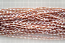 画像をギャラリービューアに読み込む, (S)淡水パール 天然色ピンク 八面光 39cm ぷっくりロンデル パフコイン
