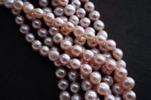 画像をギャラリービューアに読み込む, (S)淡水パール 天然色ピンク 八面光 39cm ぷっくりロンデル パフコイン