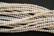 Load image into Gallery viewer, Freshwater Pearl Poppy Baroque Creo Hole White 38 cm
