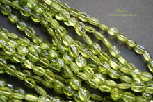 Load image into Gallery viewer, (1 row 36 cm 100 grains) High quality large peridot button cut rondel cut 4.5-5.5 x 3.5 mm
