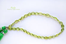 Load image into Gallery viewer, (1 row 36 cm 100 grains) High quality large peridot button cut rondel cut 4.5-5.5 x 3.5 mm
