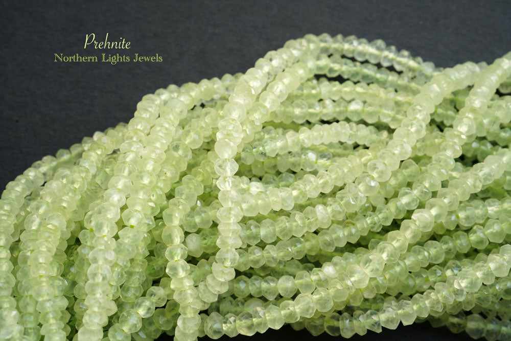 (1 row 36 cm 160 grains) Prehnite 3-4 mm button cut/faceted rondel